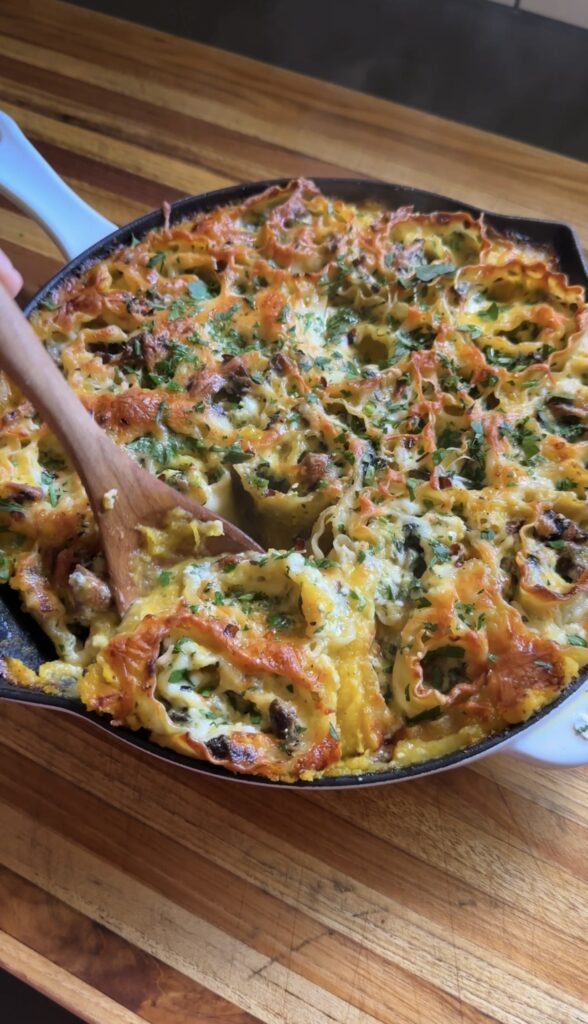 mini butternut squash lasagna roll-ups in a skillet