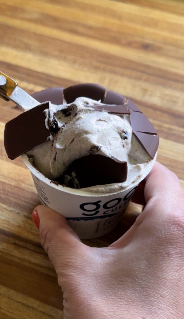 hand holding oreo cottage cheese cheesecake cups