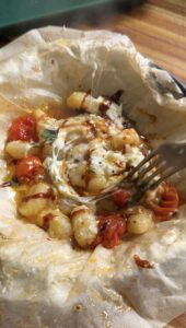 a fork digging into cottage cheese gnocchi foil packets