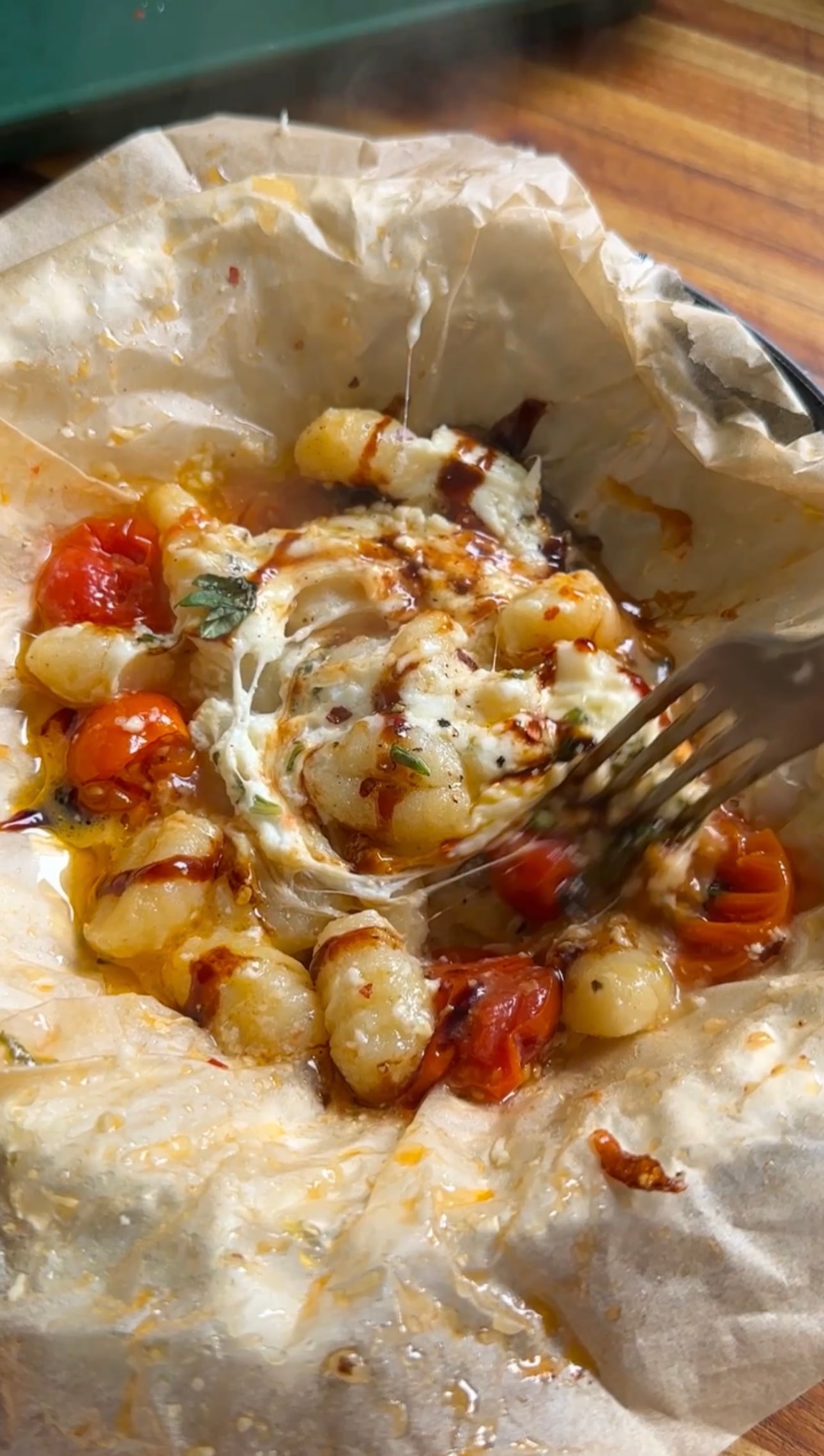 a fork digging into cottage cheese gnocchi foil packets