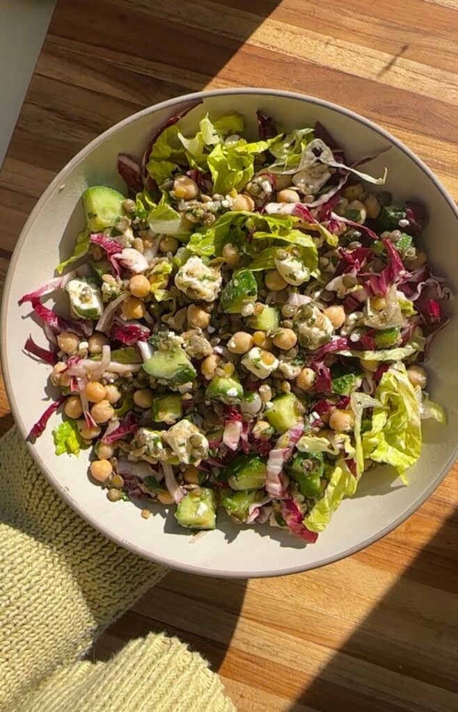a close-up of a mediterranean lentil and chickpea salad