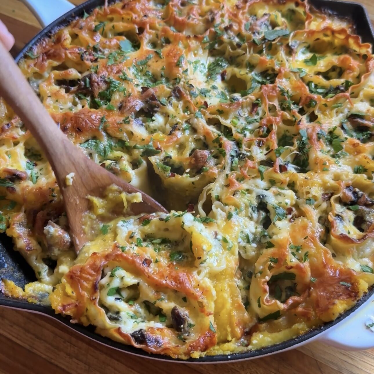mini butternut squash lasagna roll-ups in a skillet