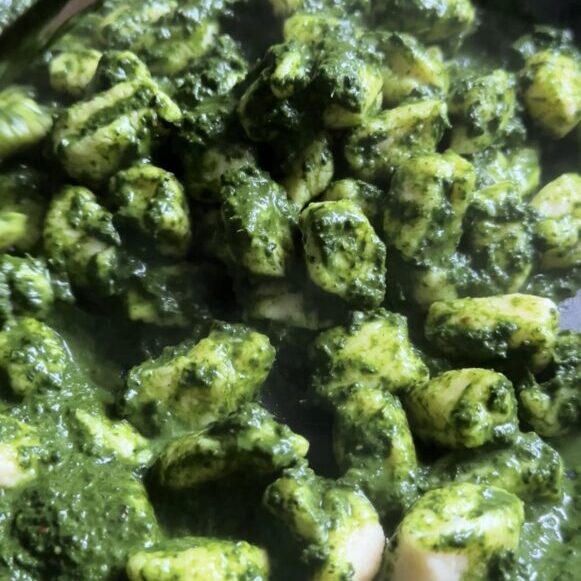 homemade cottage cheese gnocchi tossed in a vibrant kale sauce