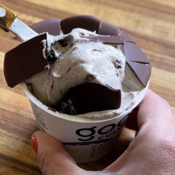 hand holding oreo cottage cheese cheesecake cups