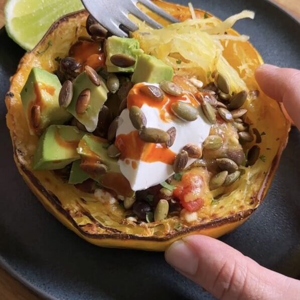 fork going into spaghetti squash burrito bowl
