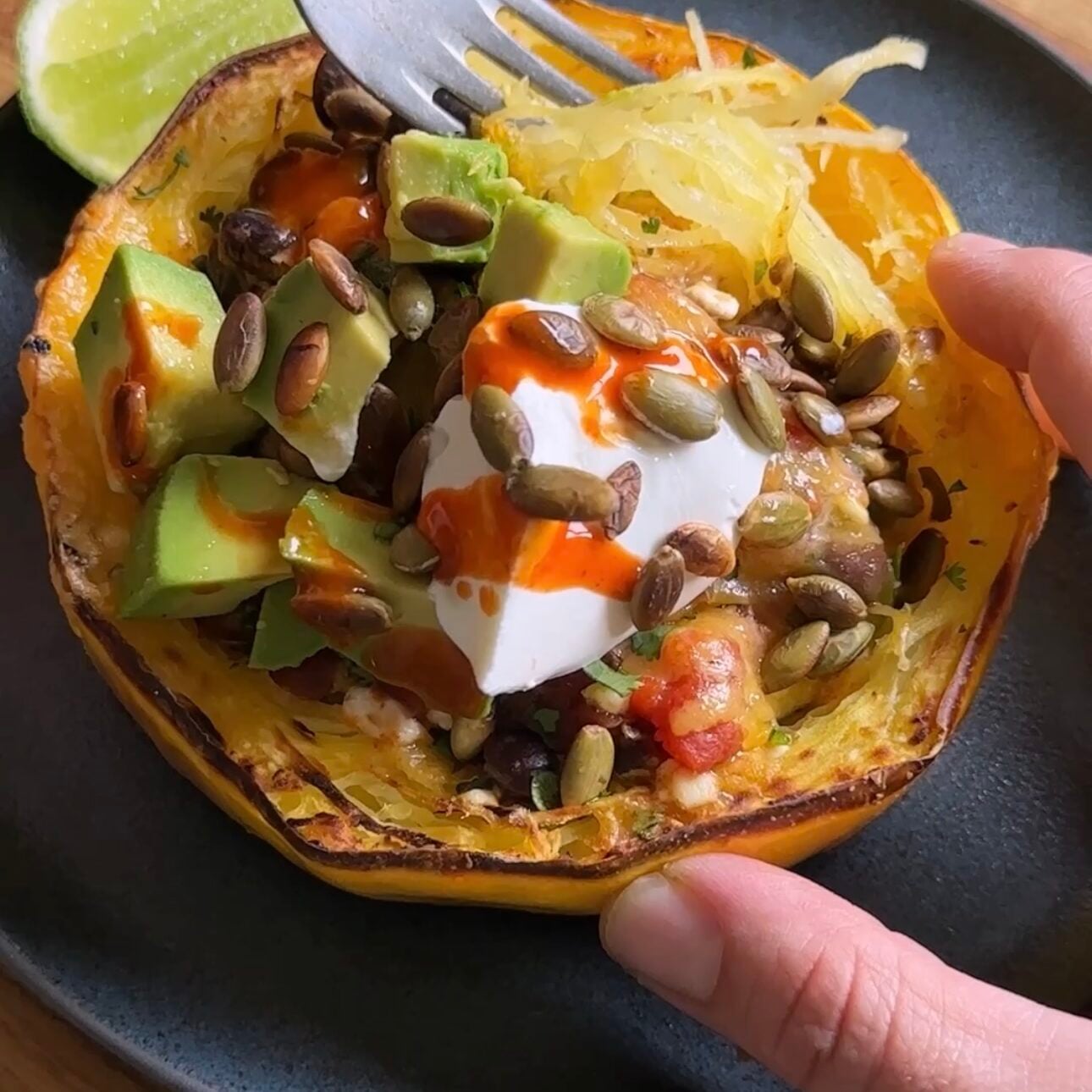 fork going into spaghetti squash burrito bowl